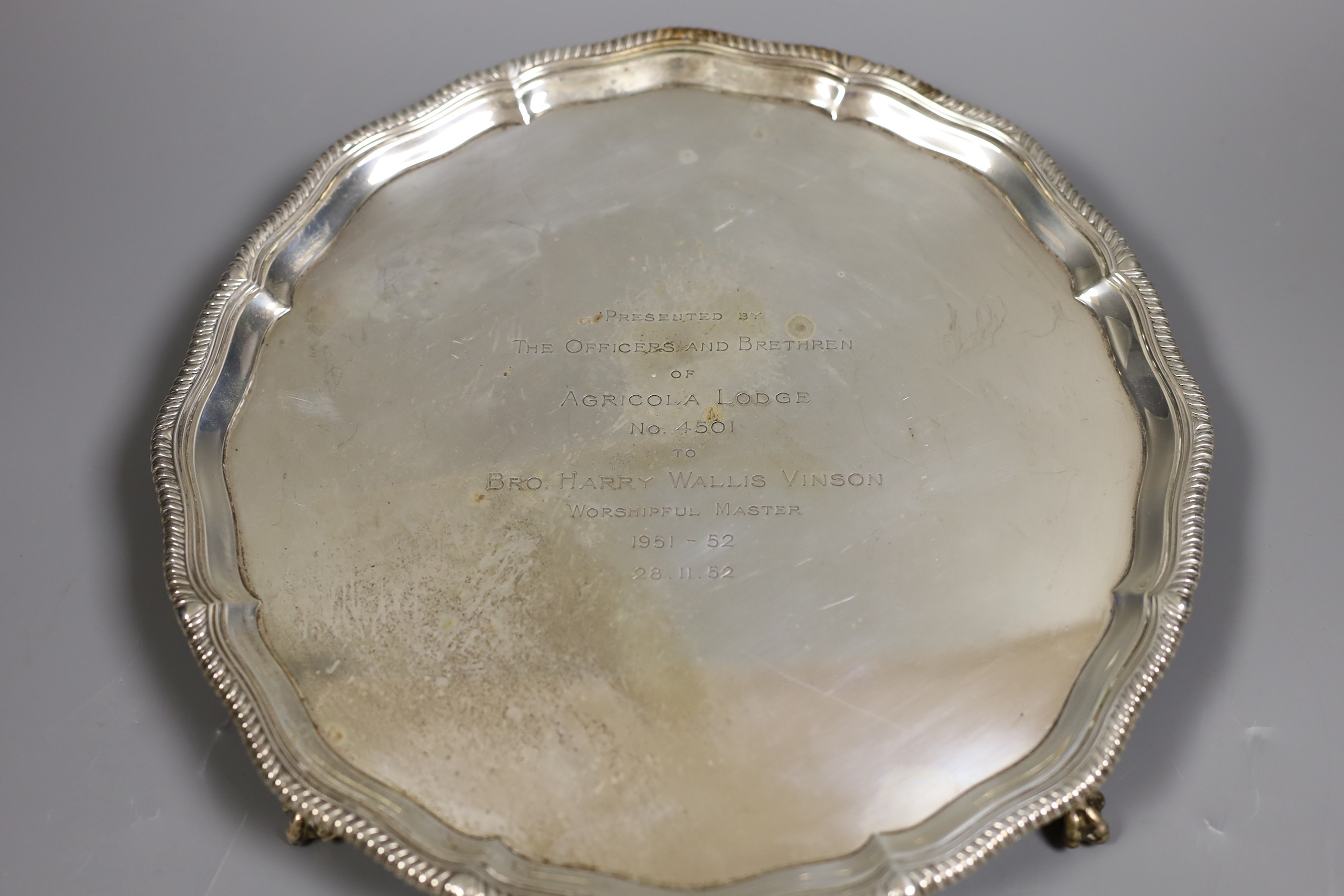 A 1950's silver presentation salver, with masonic related inscription, Goldsmiths & Silversmiths Co. Ltd, Sheffield 1952, 25.3cm, 20oz.